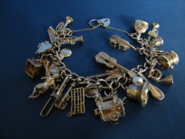 #0820 Silver Charm Bracelet - Music Themed - 24 Charms - circa 1965 **SOLD**