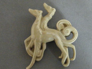 #0670 1920s or 1930s Faux Ivory Art Deco Plastic Brooch **SOLD**